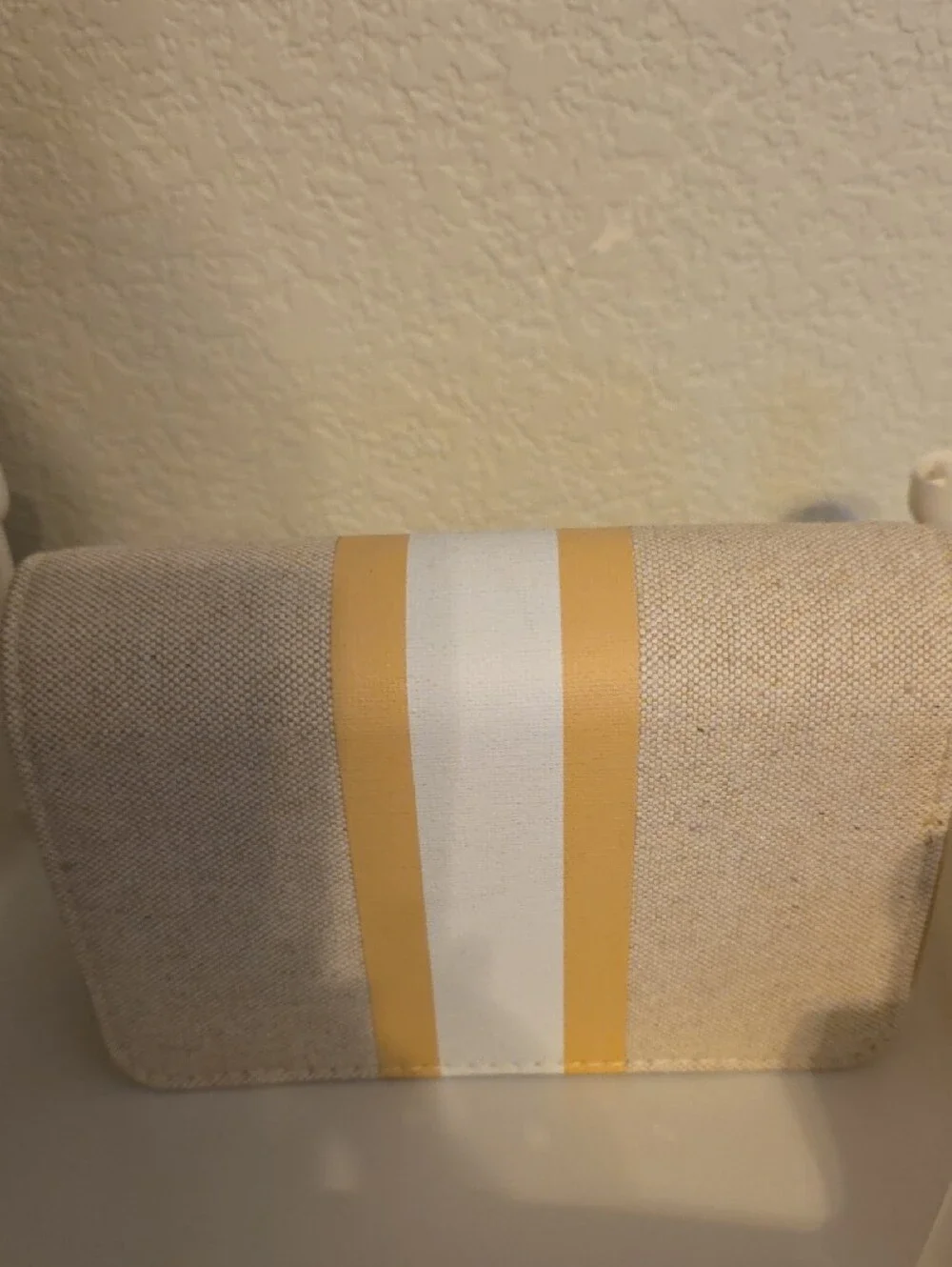 bebe Beige Clutch with Yellow and White Stripes